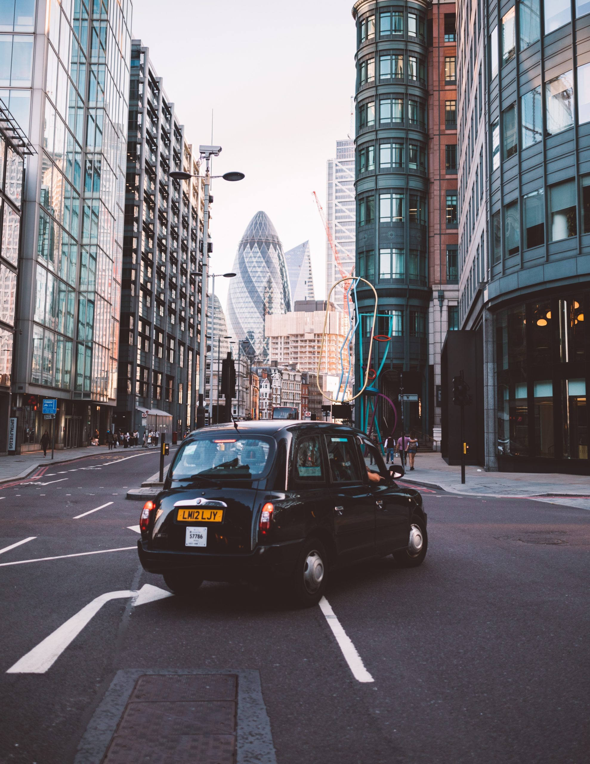London black cab with the gherkin in the background